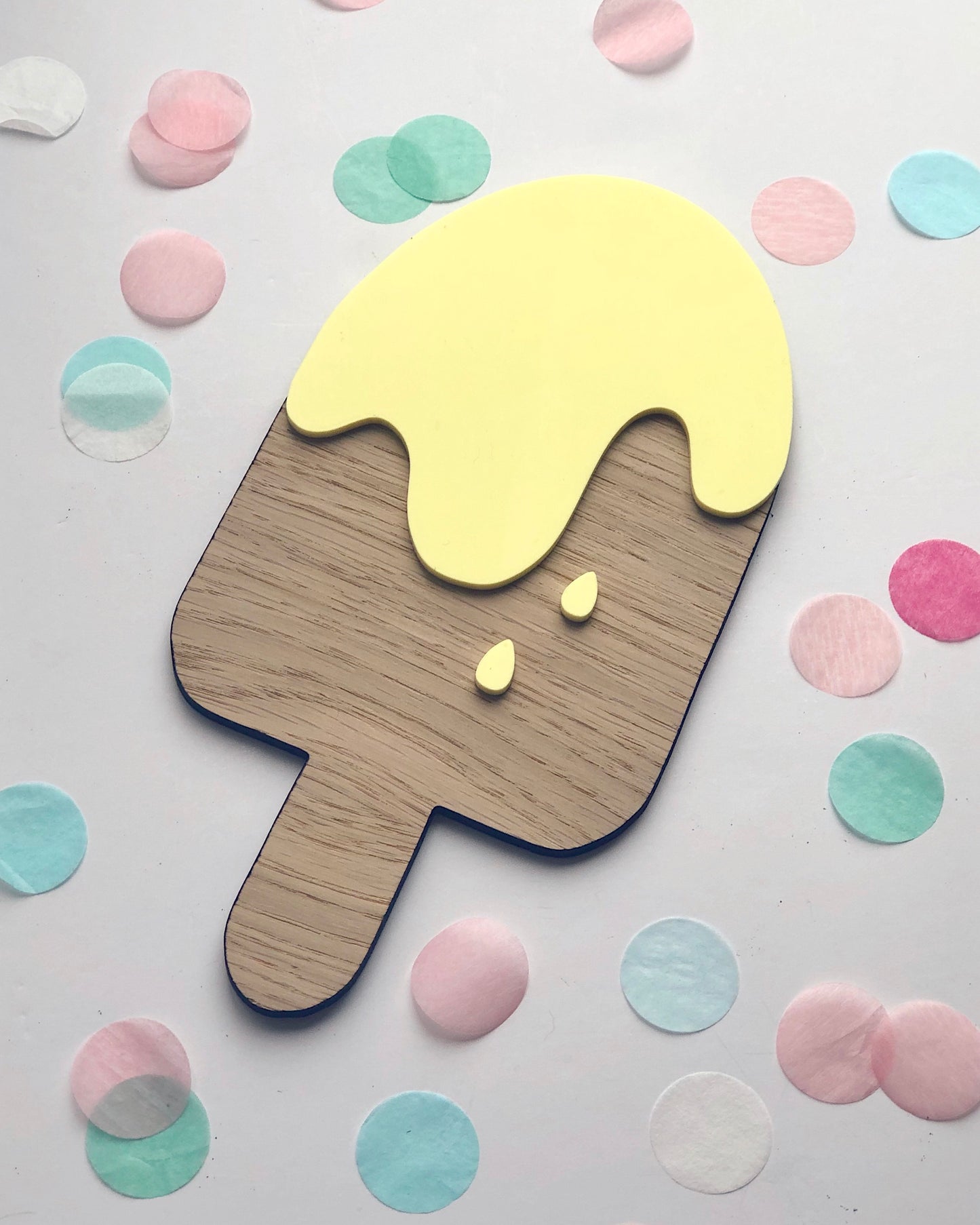 Wooden ice lolly wall decoration with pastel yellow acrylic details