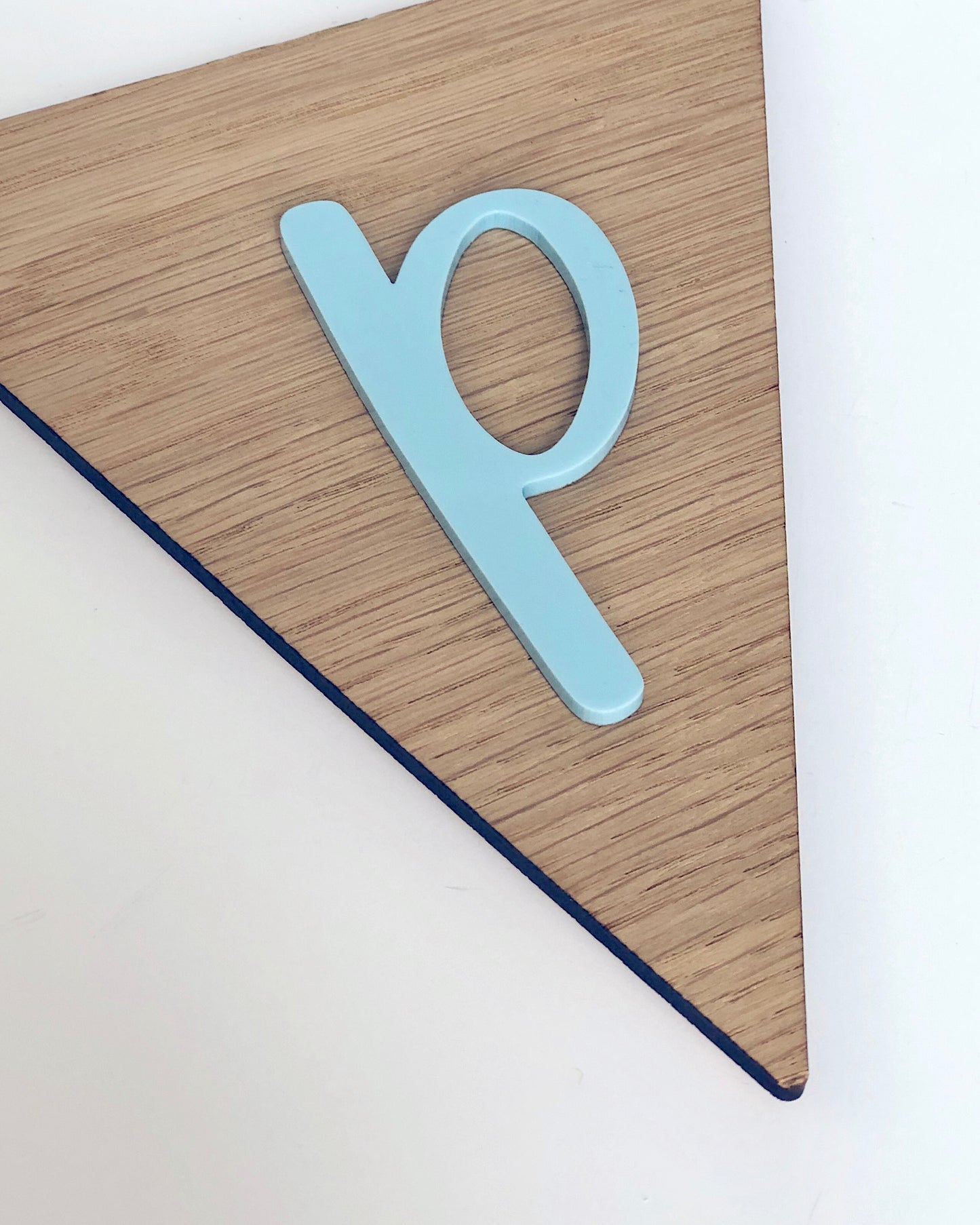 wooden bunting flag with blue acrylic letter