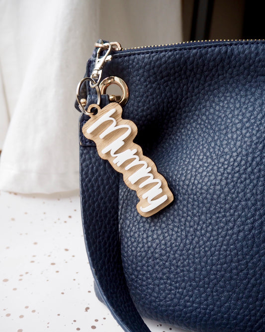 Mummy in white acrylic mounted on a wooden  laser cut key ring
