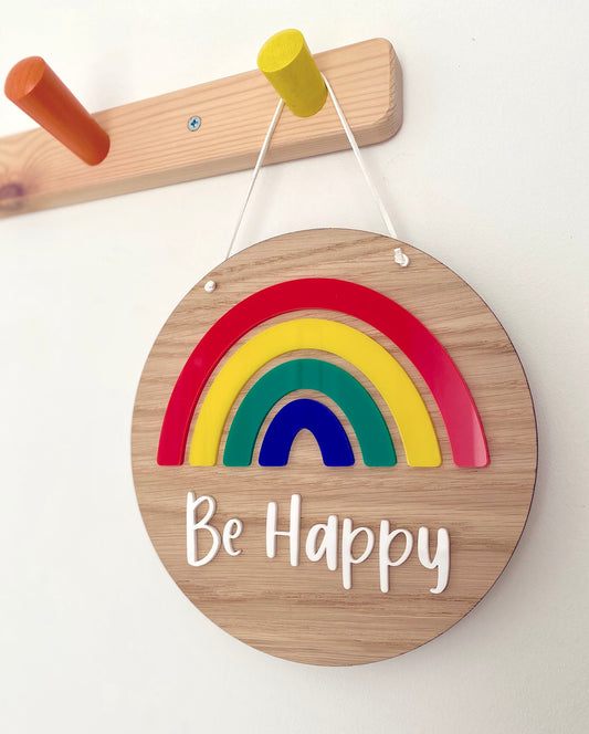 colourful rainbow plaque with Be Happy on