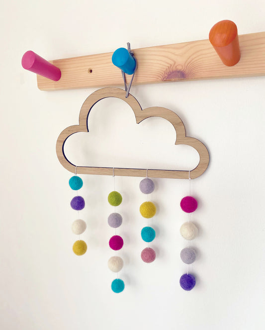 Wooden cloud with multicoloured felted pom poms