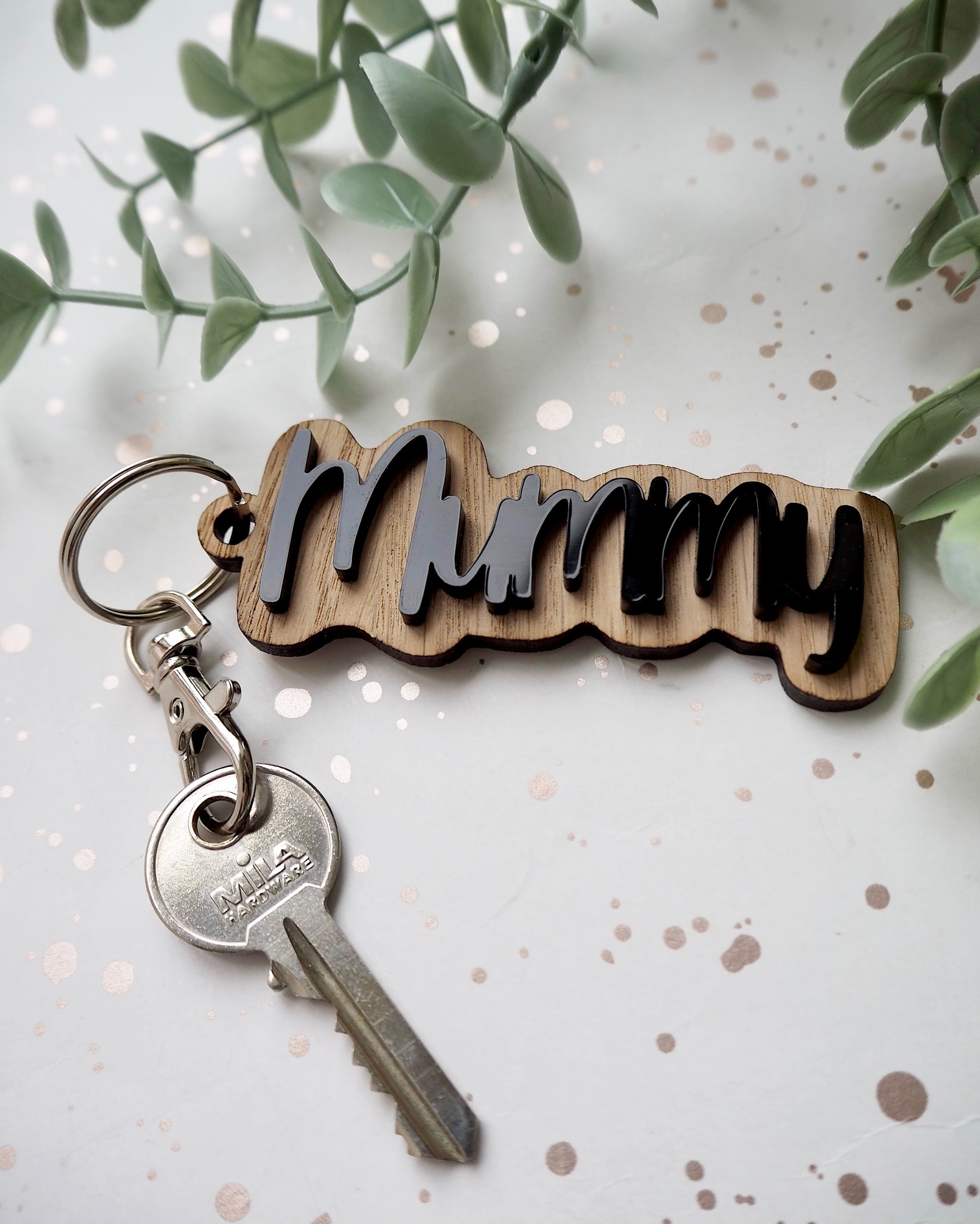 Mummy wooden key ring with black acrylic text