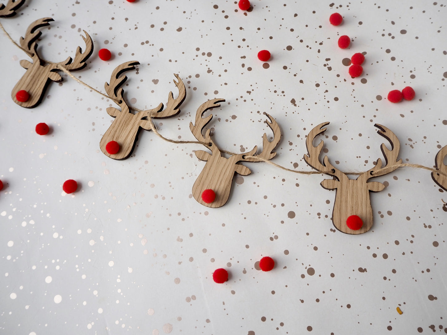 wooden reindeer garland, christmas decoration. 1 meter long and hung from jute string