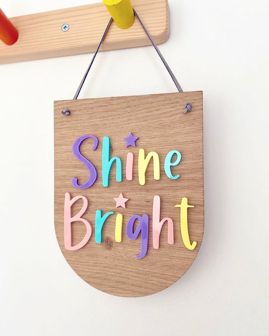 Shine Bright wooden plaque with pastel lettering