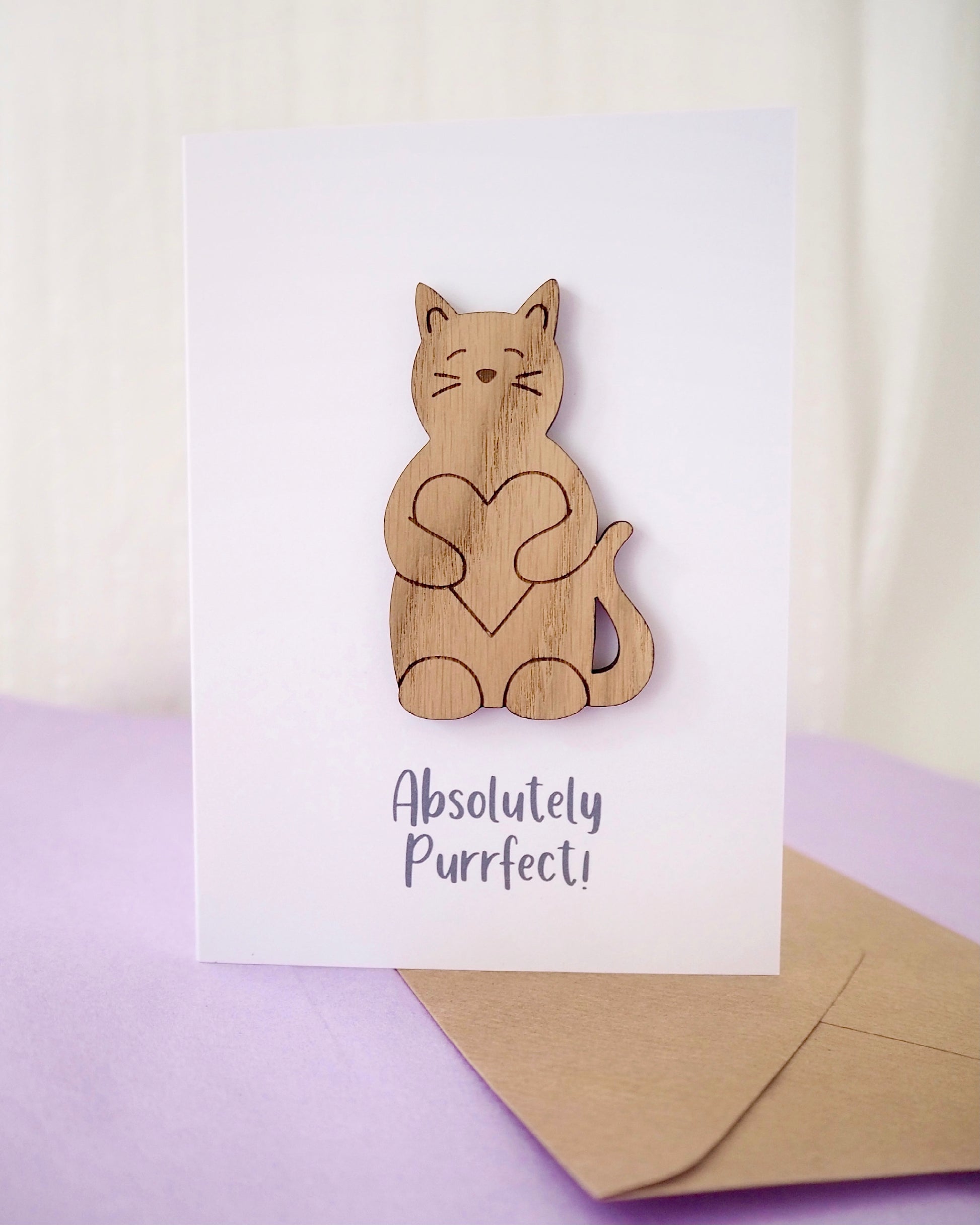 white card with wooden removable cat and the words Absolutely Purrfect!